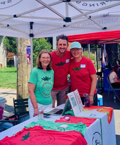 The LSNA tent at a past Tomato Art Fest, staffed by neighborhood volunteers